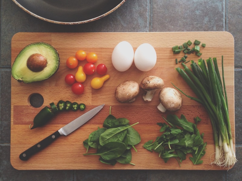 Fresh herbs and whole ingredients on a table